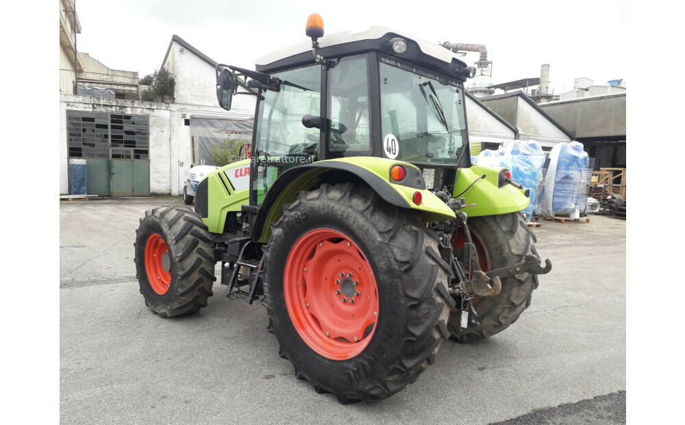 Ciągnik CLAAS AXOS 330 - 8