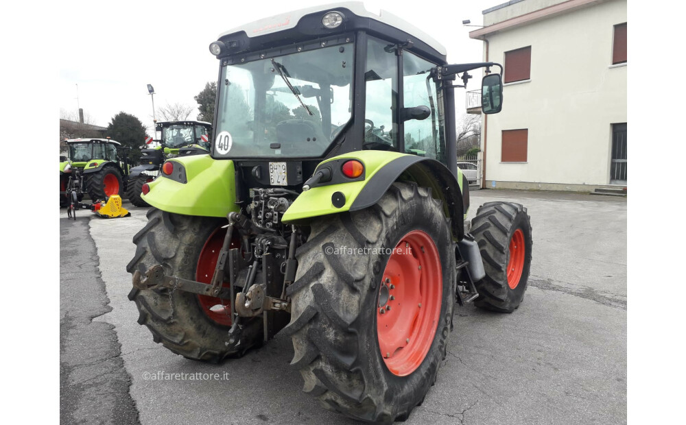 Ciągnik CLAAS AXOS 330 - 4